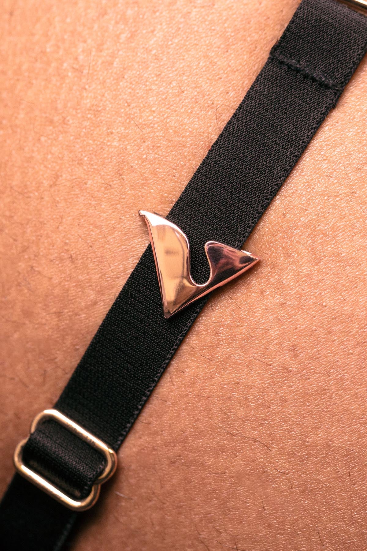 14K White Gold V Buckle Accessory on Black Strap CloseUp