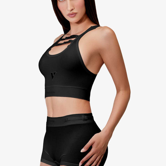 Woman modeling the black smooth-knit Sculpt Jockstrap 3" trunk, front angled view — Color: Black