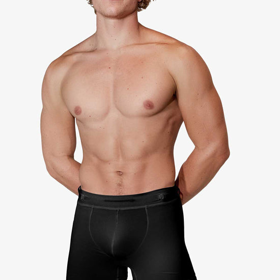 Man modeling the black Training  5" Trunk, front view — Color: Black
