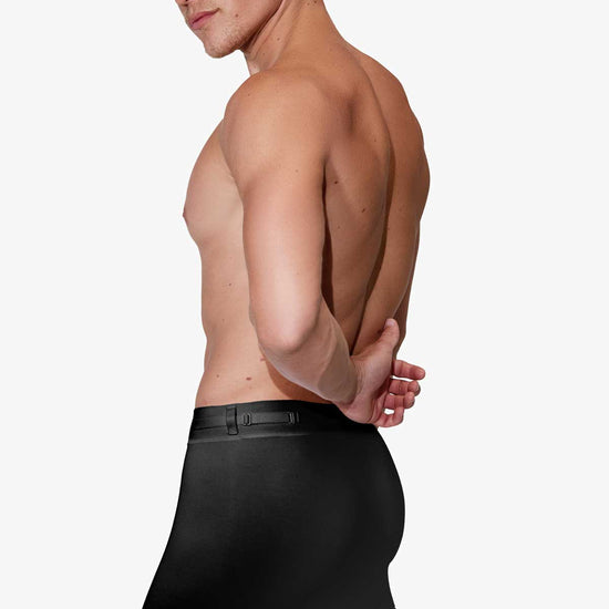 Man modeling the black Training  5" Trunk with removable straps, three-quarter front view — Color: Black
