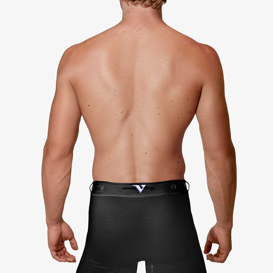 Man modeling the black Training  5" Trunk, full back view — Color: Black