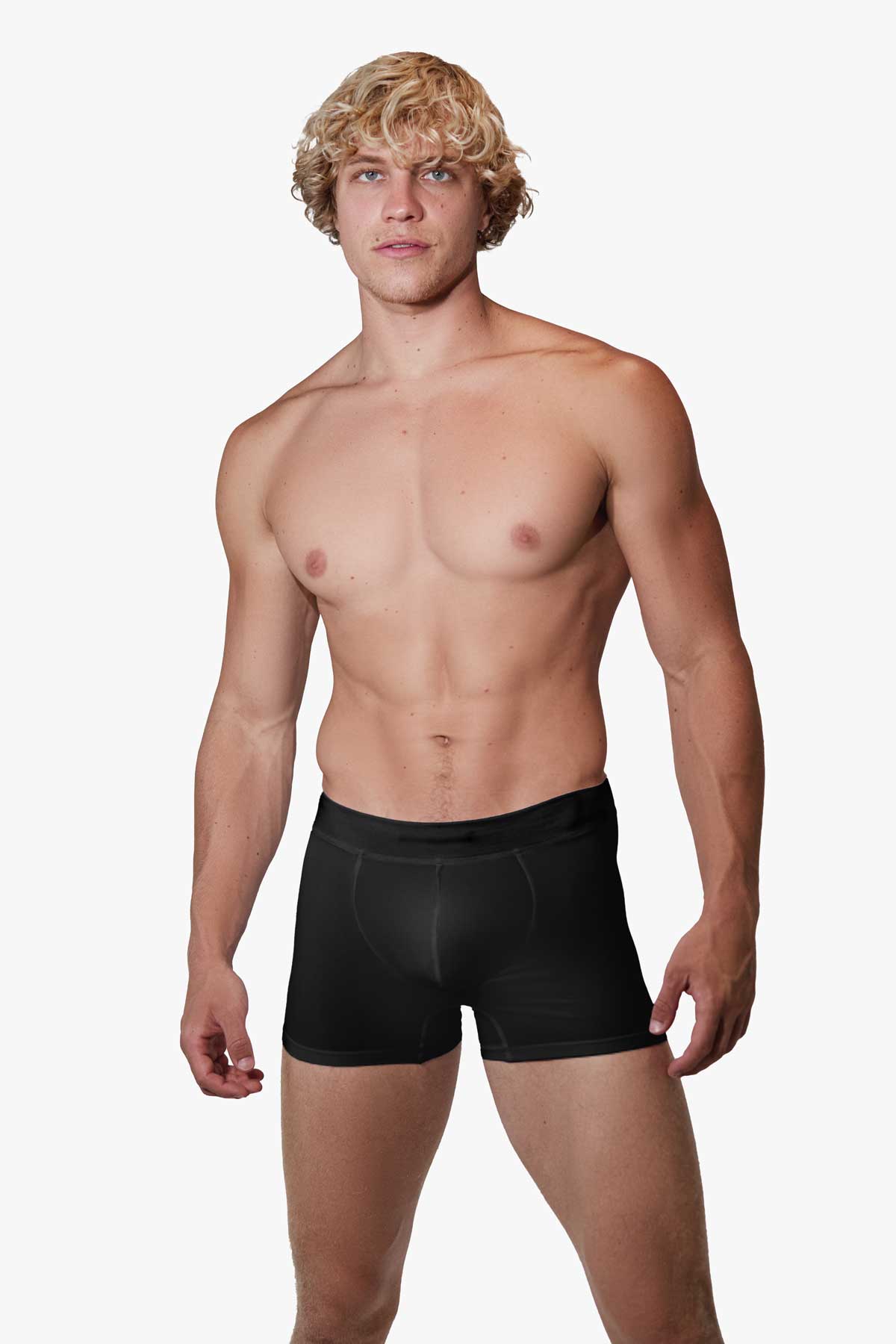 Man modeling the black Sculpt Jockstrap 3" Trunk, front view — Color: Black