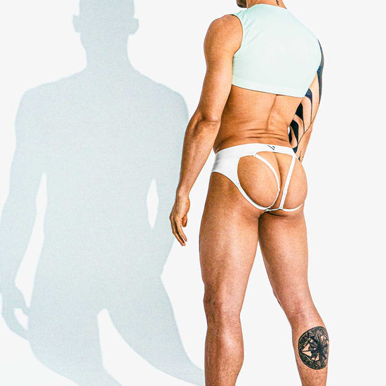 Man modeling the white Sculpt Jockstrap Brief with removable straps, back view — Color: White