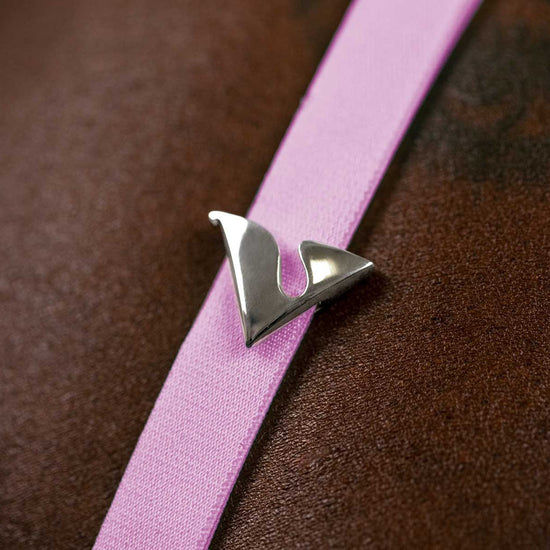 Platinum V Buckle Accessory adorned on the Taffy Virtue Strap