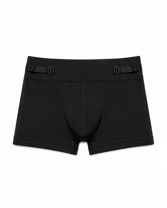 Black men's boxer trunks with adjustable waist straps featuring metal buckles, shown flat on a white background.