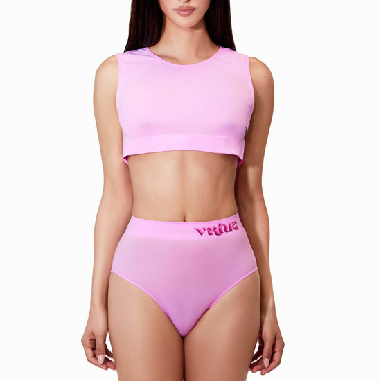Woman modeling the taffy Sculpt Jockstrap Brief and the taffy Mii Crop Top, front view — Color: Taffy