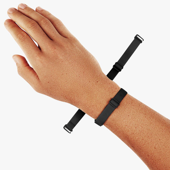 Virtue Genderless Strap Black Color Worn as Hand Cuff on Model wrist designed to be worn in different configurations strap sculpt squeeze