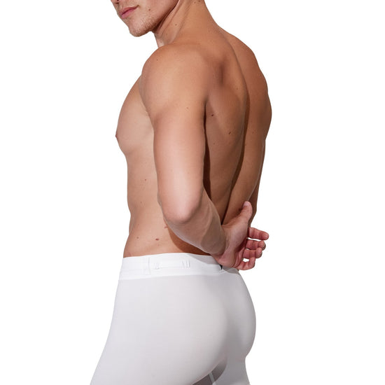 Man modeling the white Training  5" Trunk with removable straps, three-quarter back view — Color: White