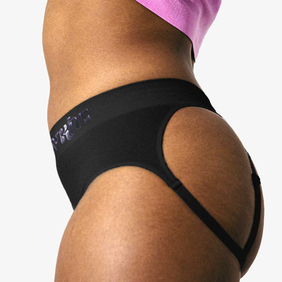 Close-up of a woman modeling the black Sculpt Jockstrap Rib Brief, side-back fit — Fabric: Rib — Color: Black