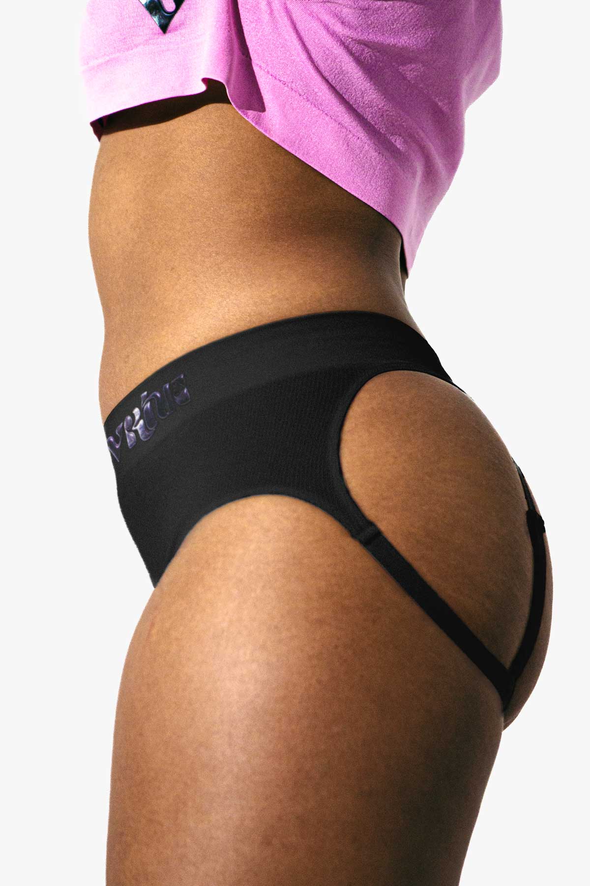 Close-up of a woman modeling the black Sculpt Jockstrap Rib Brief, side-back fit — Fabric: Rib — Color: Black