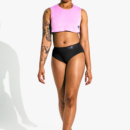 Woman modeling the black Sculpt Jockstrap Rib Brief, full front view — Fabric: Rib — Color: Black