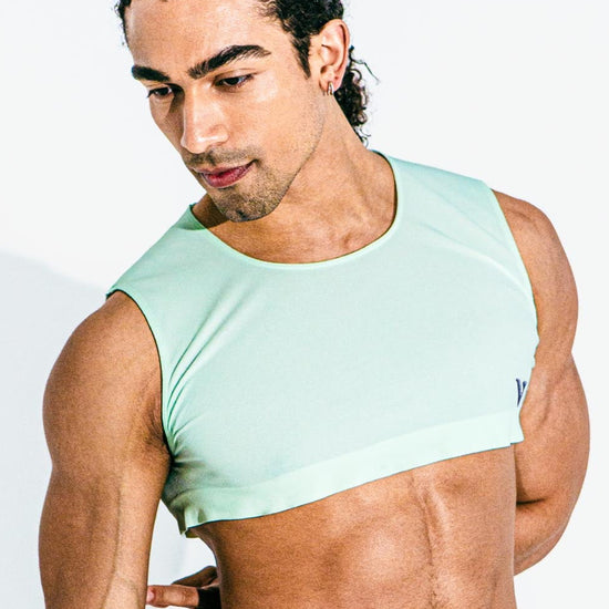 Model styling the mint Mini Crop Top with taffy briefs, front view — Color: Mint