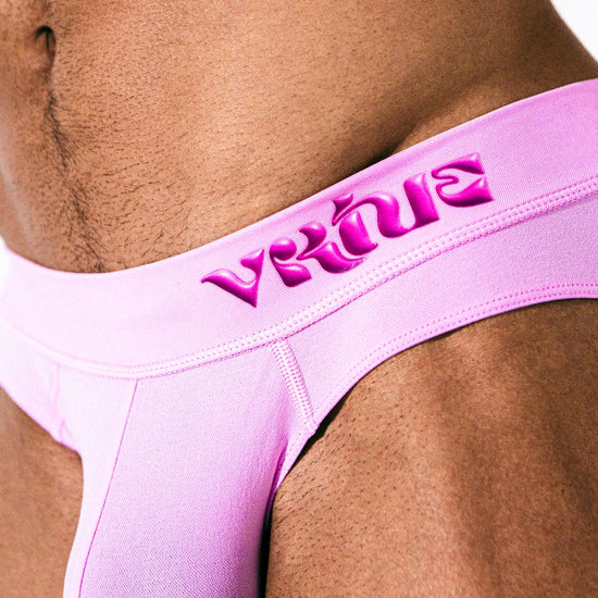 Virtue Model Mason Levant wearing Virtue Taffy Pouch Strap Closeup