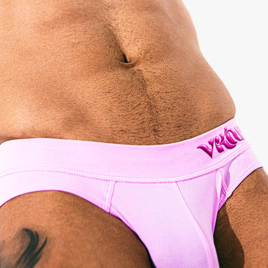 Virtue Model Mason Levant wearing Virtue Taffy Pouch Strap Detail