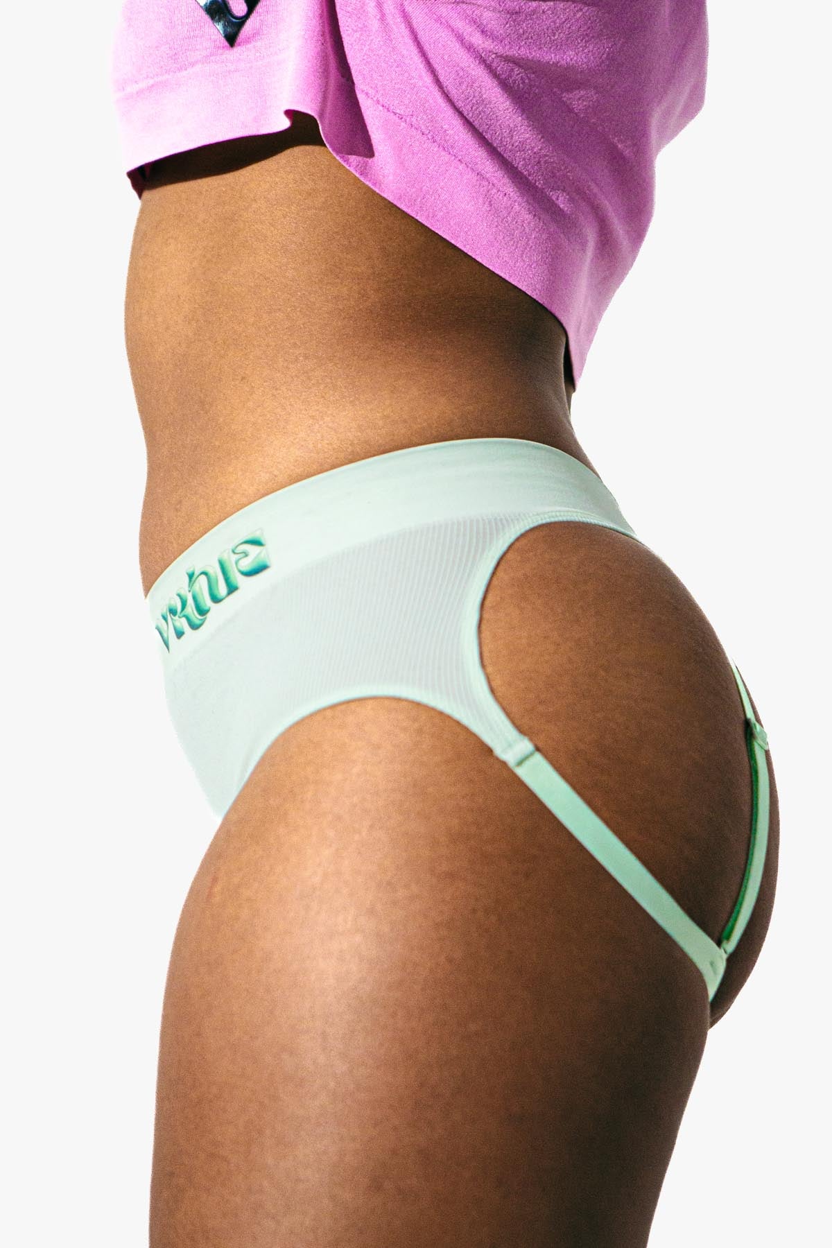 Virtue Model posing in Mint Rib Knit Compact Fit Strap Brief Side View