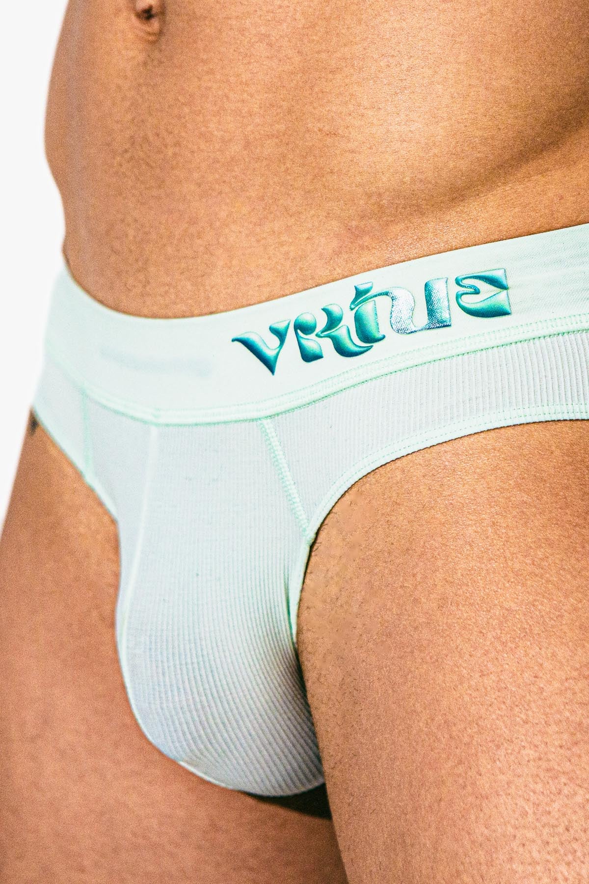Virtue Model posing in Mint Rib Knit Pouch fit Strap Briefs Front View
