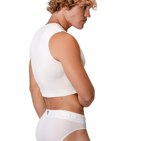 Man modeling the white Core Brief with removable straps, three-quarter back view — Color: White